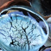 Ecarteur plug en verre noir et gris à motif craquelé
