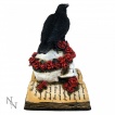 Figurine corbeau sur crane et grimoire gothique (17cm)