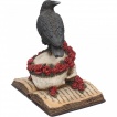 Figurine corbeau sur crane et grimoire gothique (17cm)