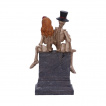 Figurine couple de squelettes assis sur une tombe (17cm) - Nemesis Now