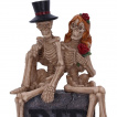 Figurine couple de squelettes assis sur une tombe (17cm) - Nemesis Now