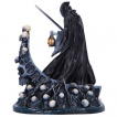 Figurine faucheur d'mes sans visage se tenant  la barre d'un sombre bateau  (19cm)