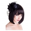 Mini chapeau noir fleuri à voilage