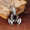 Pendentif scorpion inox  pierre rouge