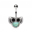 Piercing nombril petite chouette en vol avec Turquoise