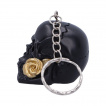 Porte clé tête de mort noire à rose dorée