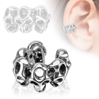 Faux piercing oreille  6 ttes de mort sculptes