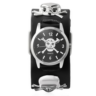 Montre gothique avec 3 ttes de morts  os croiss