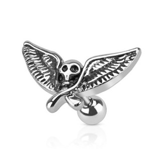 Piercing tragus avec tte de mort aile noircie